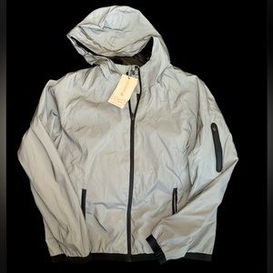 Reflective workout jack. NWT. Sz 12. Lots of pockets